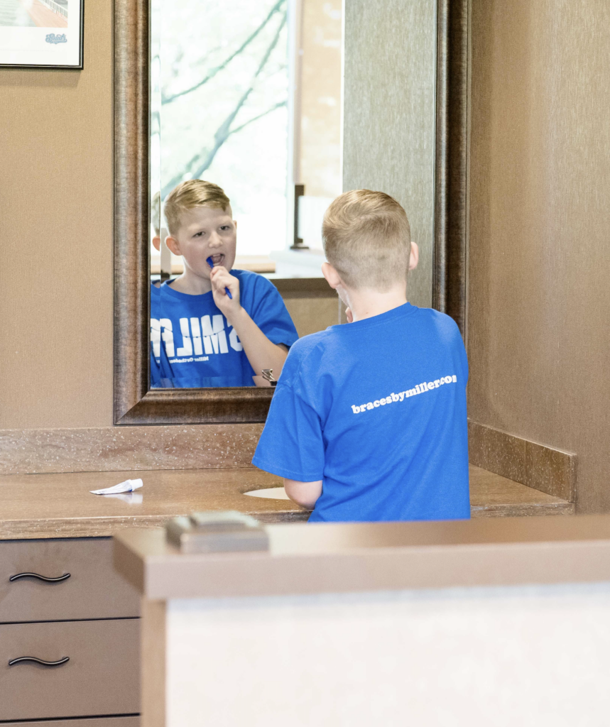 Child Brushing His Teeth